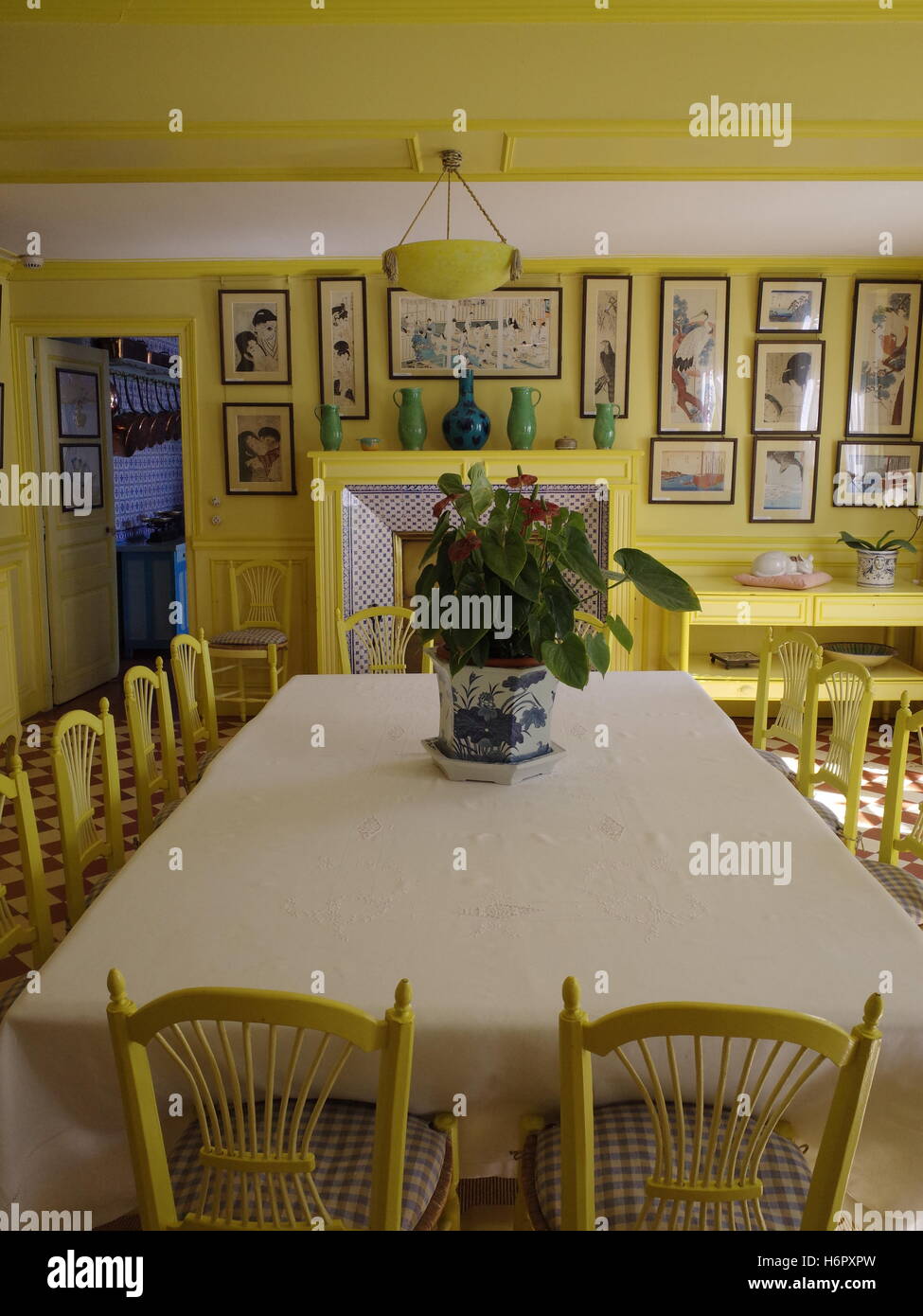 A yellow dining room in house in Giverny, France Stock Photo