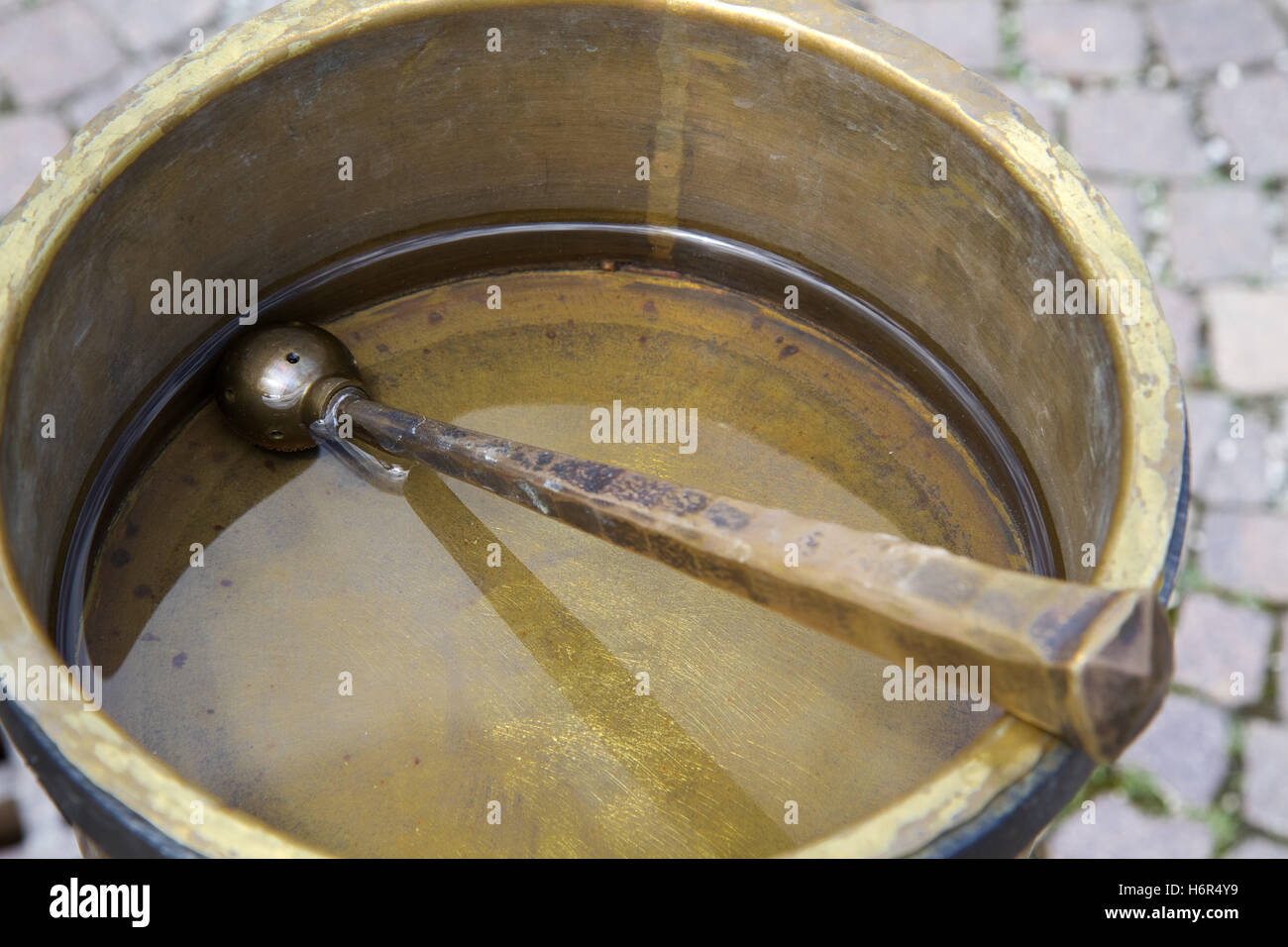 brass bowl with holy water Stock Photo