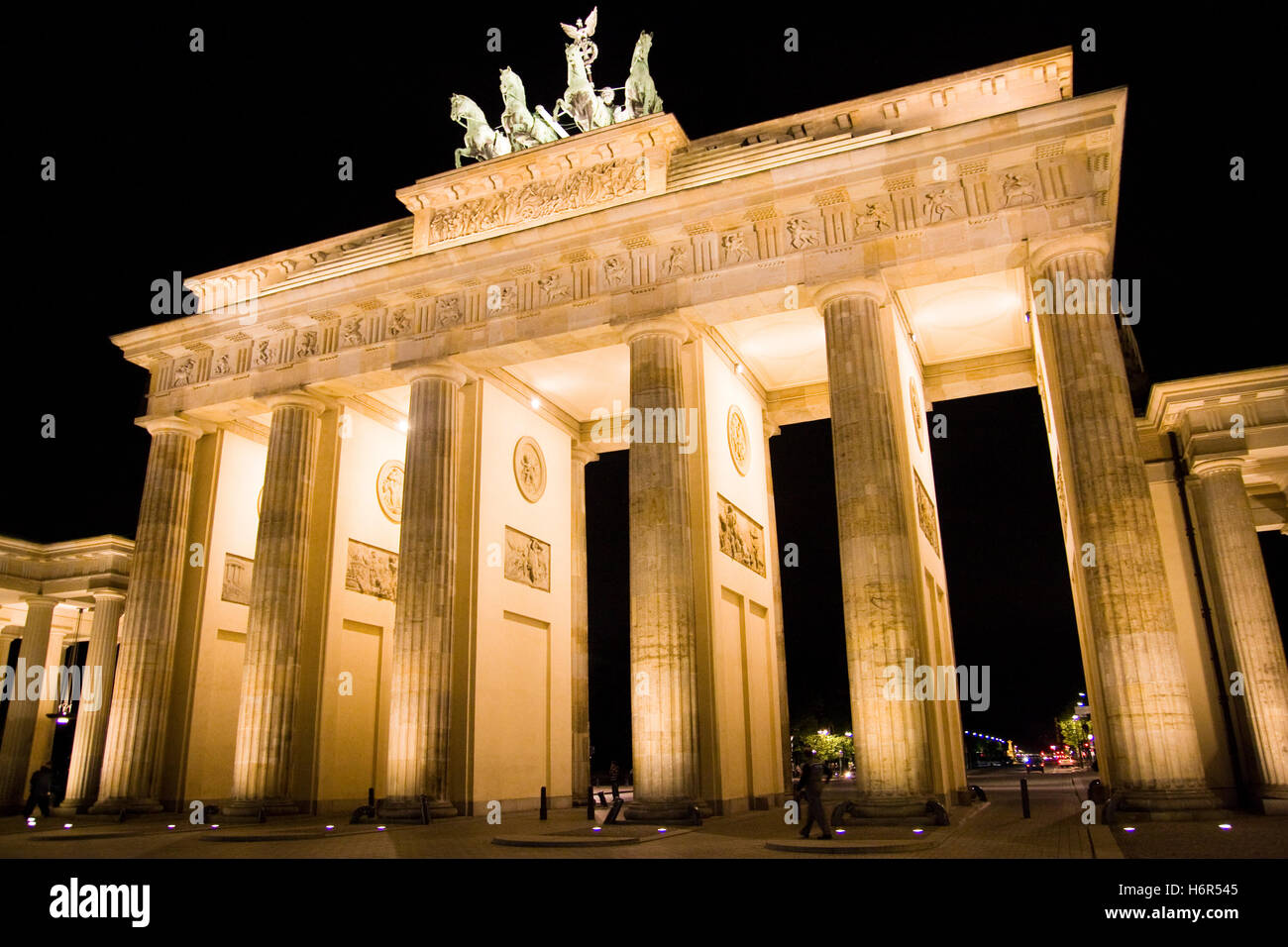 monument night photography tourism sightseeing pillar berlin woman shine shines bright lucent light serene luminous beautiful Stock Photo