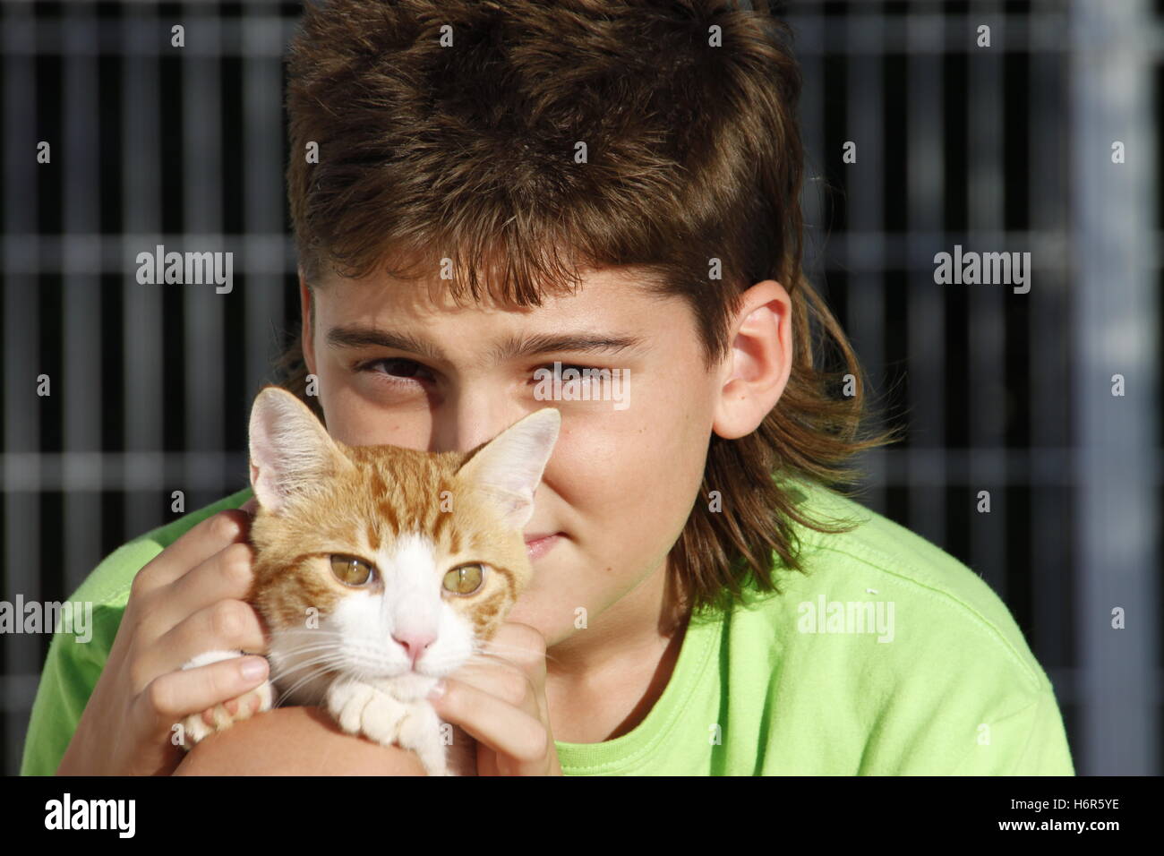 teenager with his cat Stock Photo Alamy