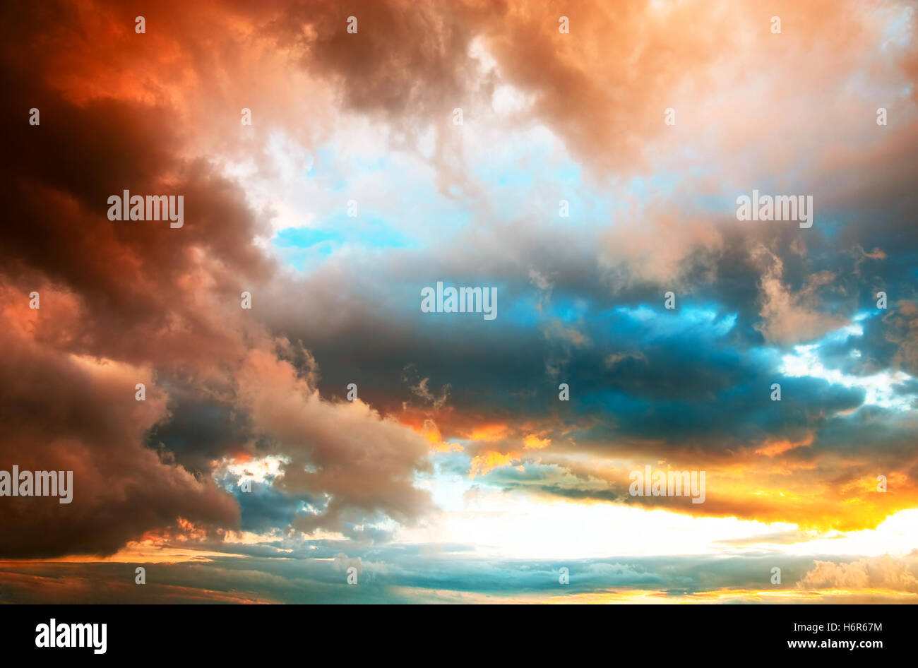 dramatic evening sky with colored clouds vigorously Stock Photo