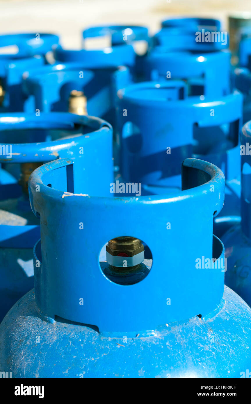 blue danger object liquid closeup industry industrial energy power electricity electric power steel bottle fuel gas container Stock Photo