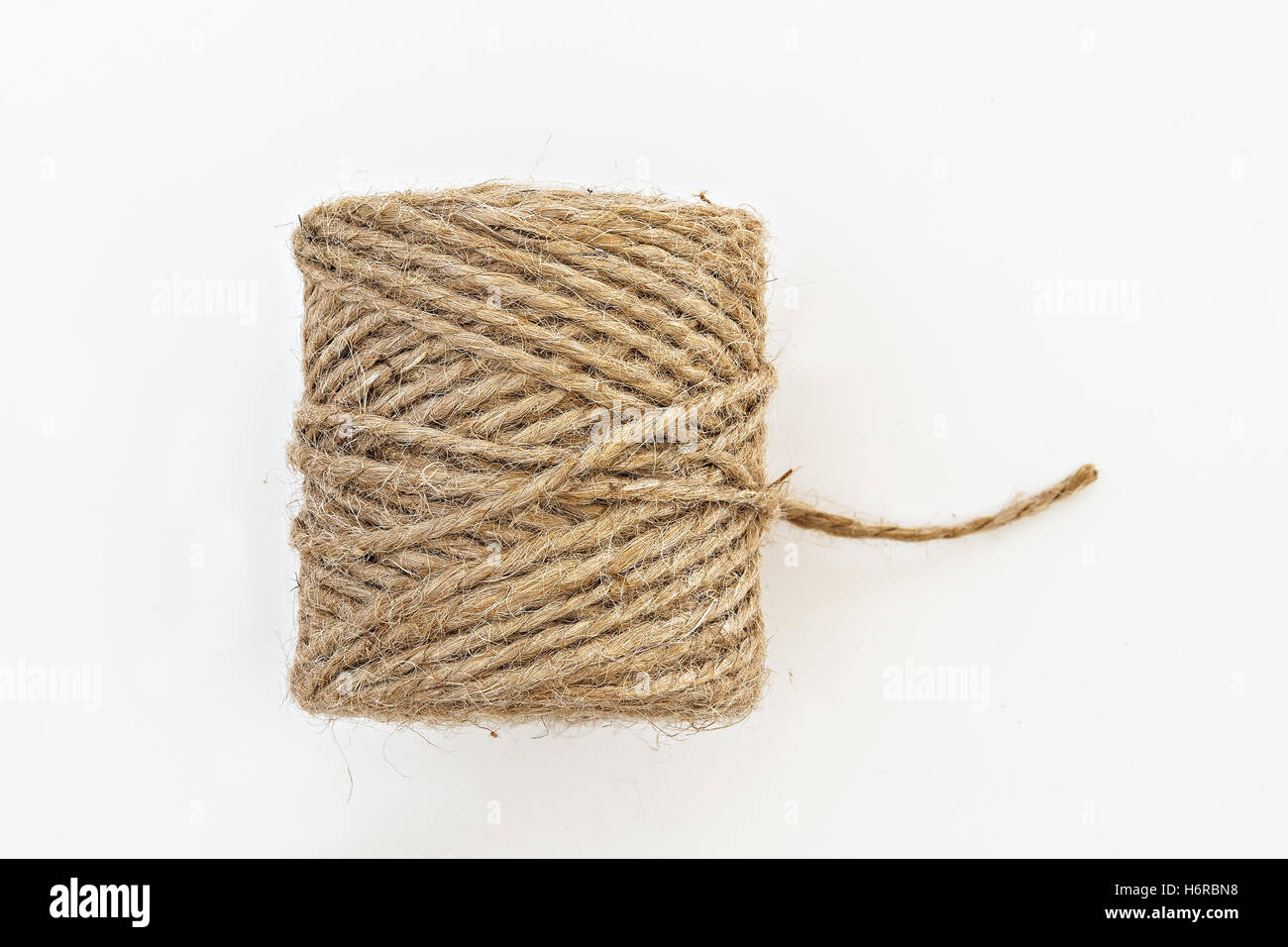 Roll Of Linen String Rope Isolated Stock Photo - Download Image