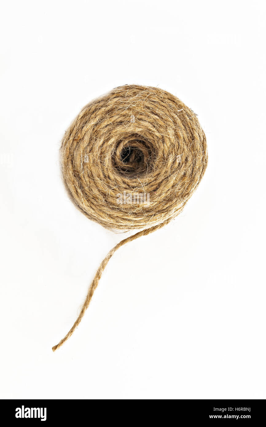 kraft brown twine isolated on a roll. Stock Photo