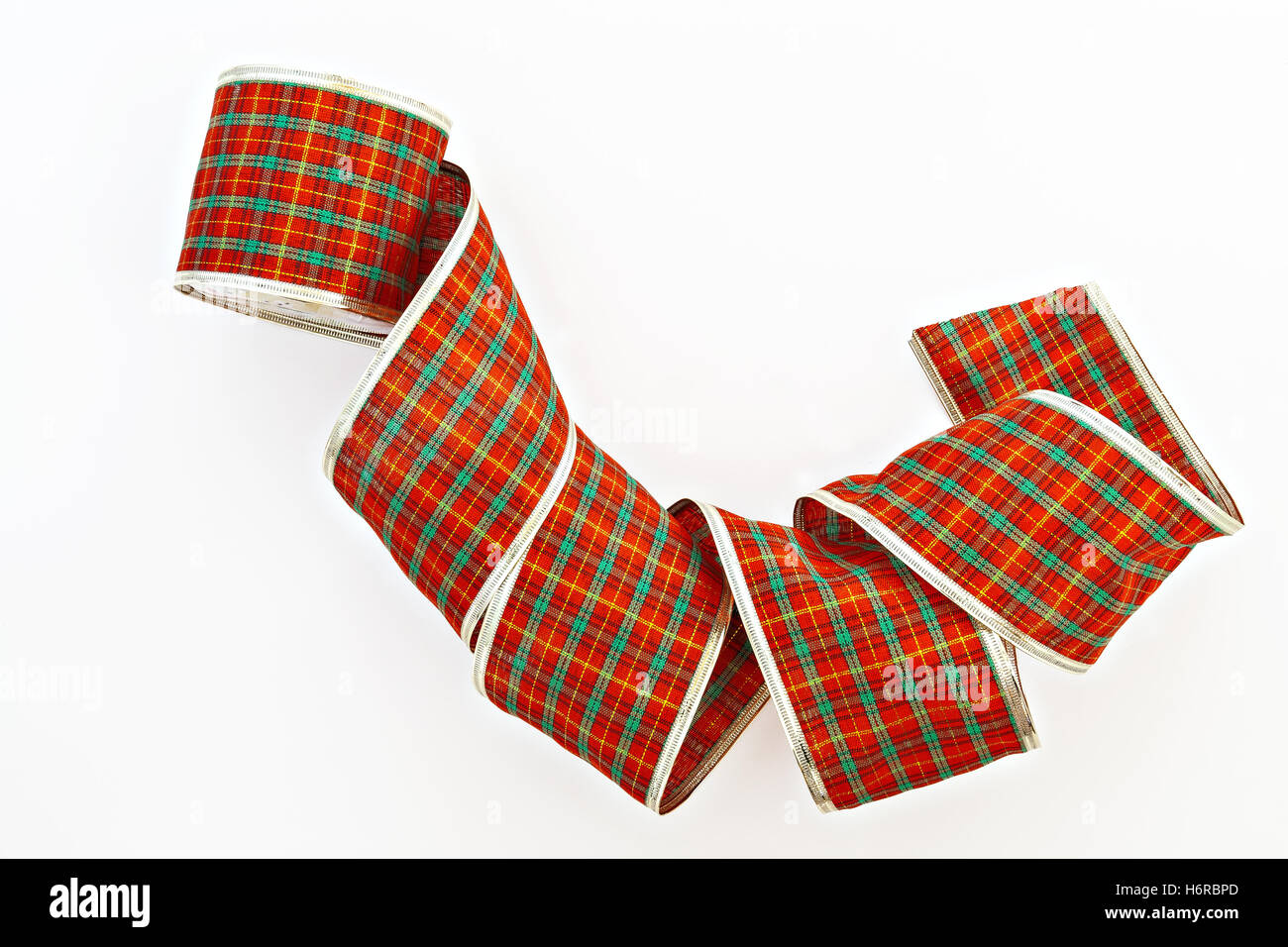 red decorative wrapping tape isolated in a cage Stock Photo Alamy