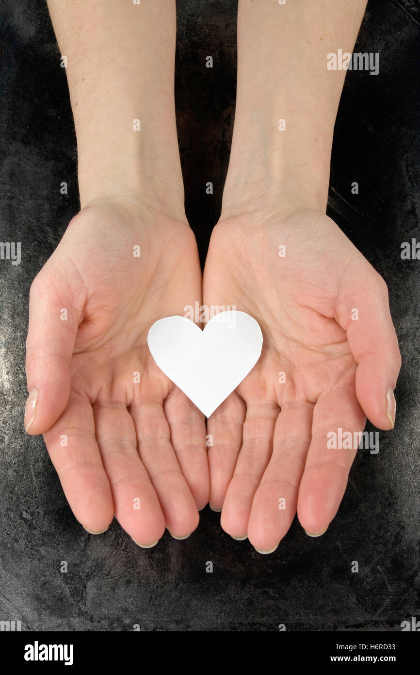 hand feeling romantic darling love in love fell in love valentine heart healthy humans human beings people folk persons human Stock Photo