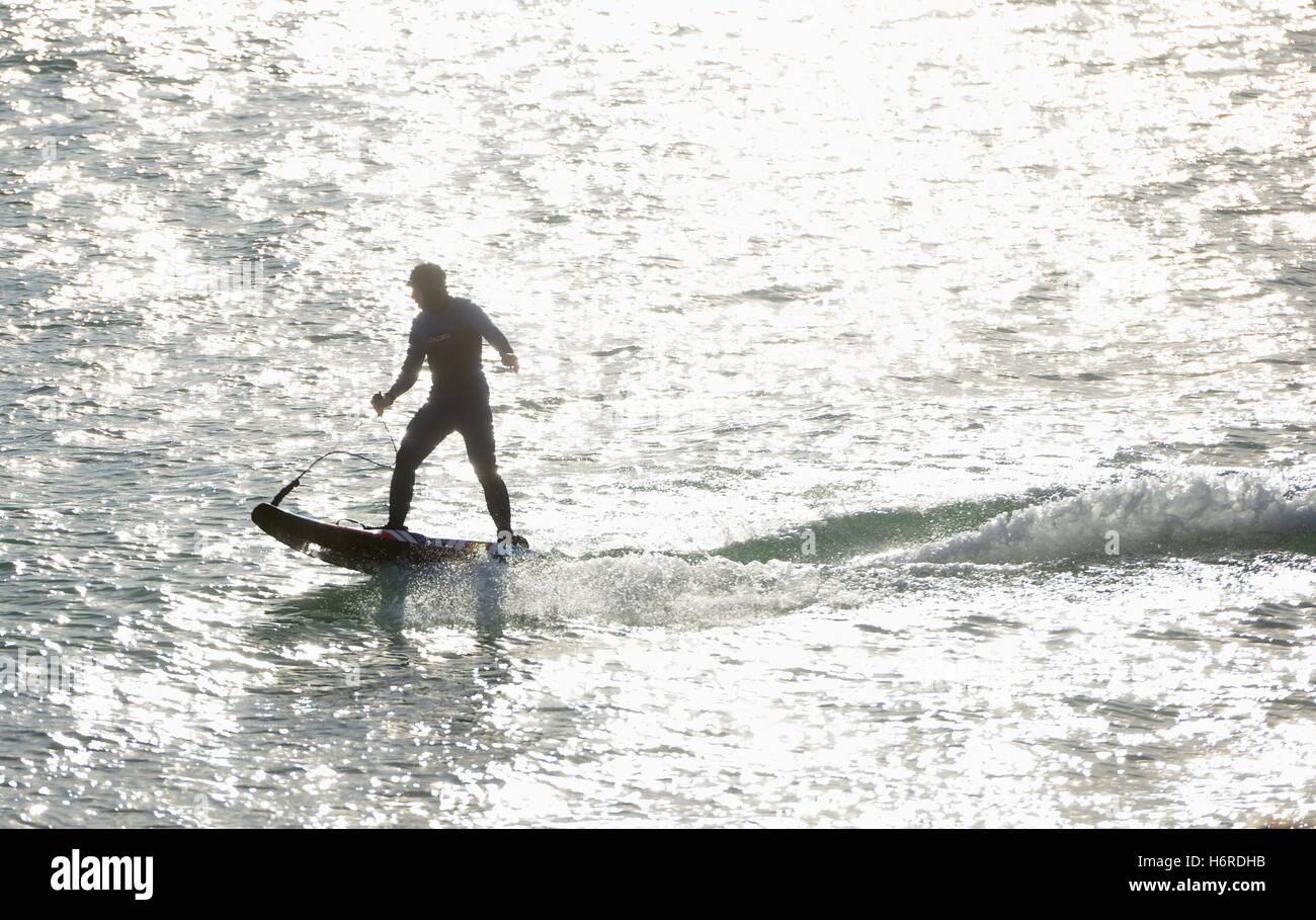 Seaford, Sussex, UK. 31st October, 2016. Electric jet surfboarders enjoying the warm 20 degree weather Credit:  Peter Cripps/Alamy Live News Stock Photo