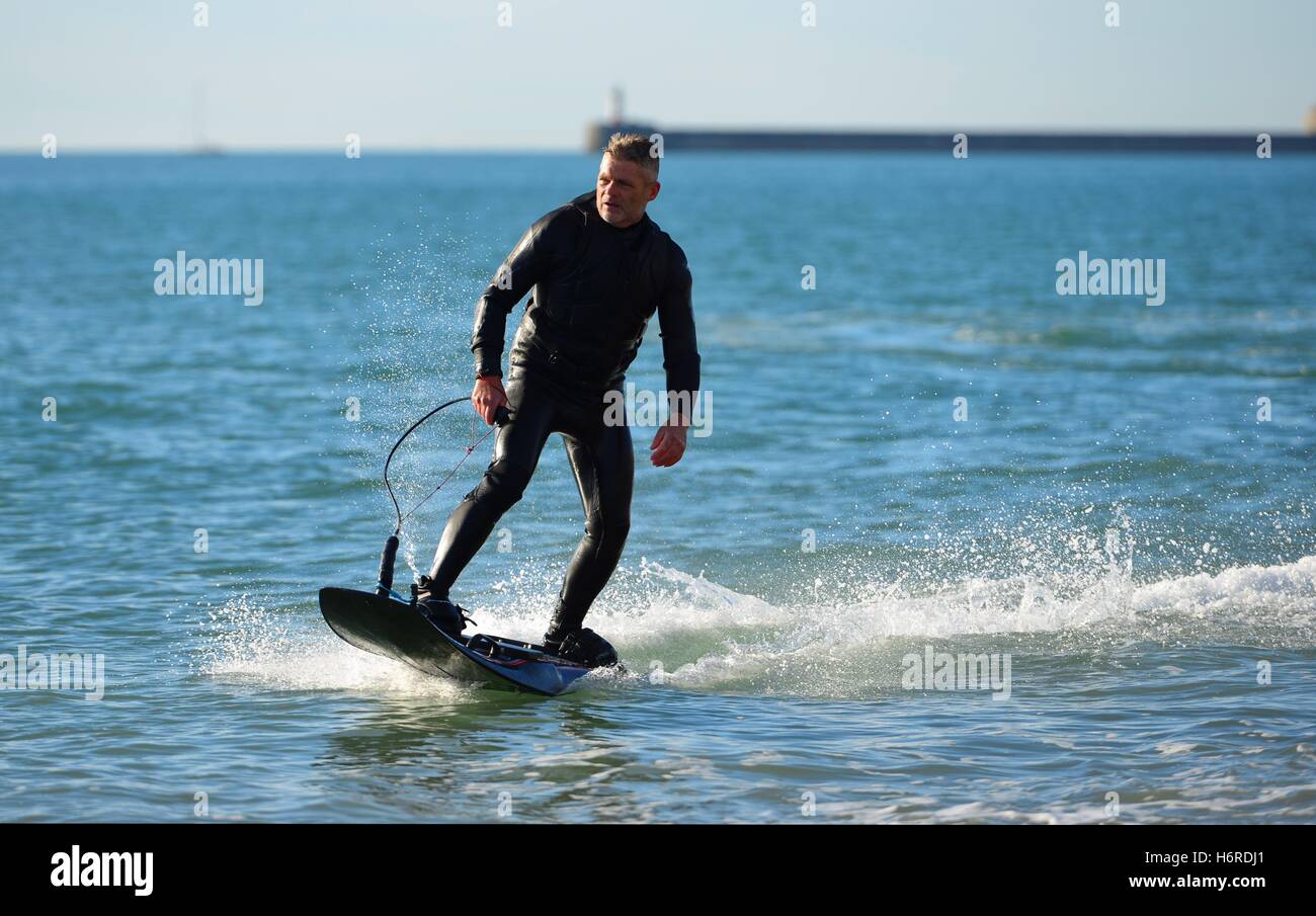 Seaford, Sussex, UK. 31st October, 2016. Electric jet surfboarders enjoying the warm 20 degree weather Credit:  Peter Cripps/Alamy Live News Stock Photo