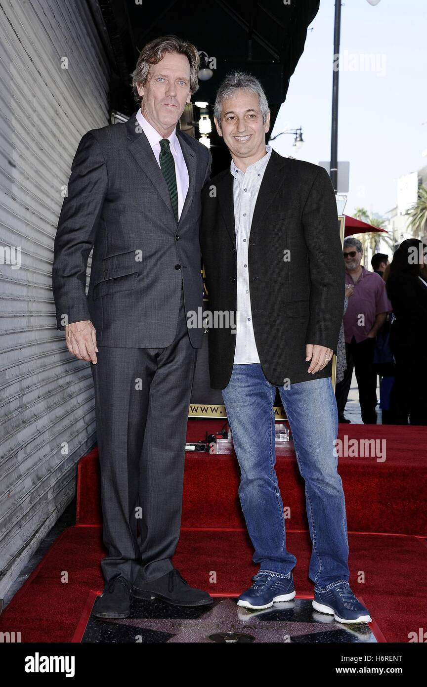 Los Angeles, CA, USA. 25th Oct, 2016. Hugh Laurie, David Shore at the induction ceremony for Star on the Hollywood Walk of Fame for Hugh Laurie, Hollywood Boulevard, Los Angeles, CA October 25, 2016. © Michael Germana/Everett Collection/Alamy Live News Stock Photo