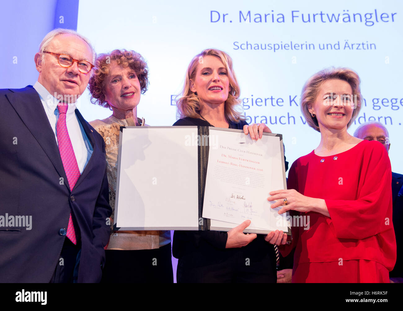 German actress Maria Furtwaengler (C) with her husband, publisher Hubert Burda (L), her mother Kathrin Ackermann (2-L) and Minster for Defence Ursula von der Leyen (R) after receiving the Leibinz Ring, an award for special achievements awarded by the Press Club Hanover since 1997, in Hanover, Germany, 31 October 2016. Furtwaengler received the award for her work for the prevention of violence against children. The original ring, made especially for Furtwaengler, was stolen. Furtwaengler was presented with a hastily made replica of the original. Photo: Hauke-Christian Dittrich/dpa Stock Photo