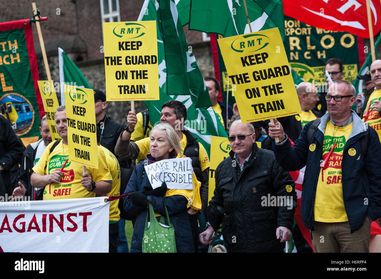 London, UK. 1st November 2016. The National Union of Rail, Maritime and Transport Workers (RMT) held demonstration outside Parliament to oppose Southern Rail plans for the driver-only-operation trains and support Southern Rail conductors in their dispute over changes to the role of train guards. The representatives of unions together with organisations of pensioners and disabled argued that abolition of train conductors will have a negative impact on passenger safety. Wiktor Szymanowicz/Alamy Live News Stock Photo