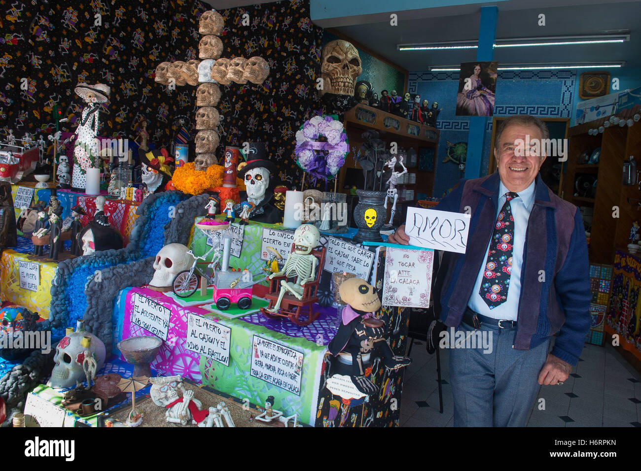 Mexico City, Mexico City, MX. 1st Nov, 2016. Mr. Marco Antonio Uribe Perez has decorated his store with a day of the dead altar.Skulls and altars with ofrendas have been placed all over the City. The altar is one of the most unique ways Day of the Dead is celebrated. An altar is made in honor of the deceased and can be displayed at a gravesite, park or in the home. Offerings of food, beverages and prized possessions are displayed. The ofrenda and the altars are used to welcome the ancestors' spirits into the home. Credit:  Joel Alvarez/ZUMA Wire/Alamy Live News Stock Photo