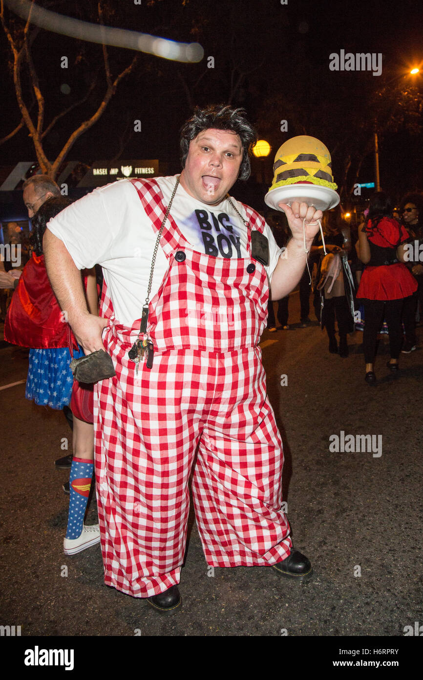 West Hollywood, California, USA. 31st October 2016. Halloween reveler  dressed in costume as the iconic "Bob's Big Boy" character poses for a  photo with his incense burner at the 28th Annual West