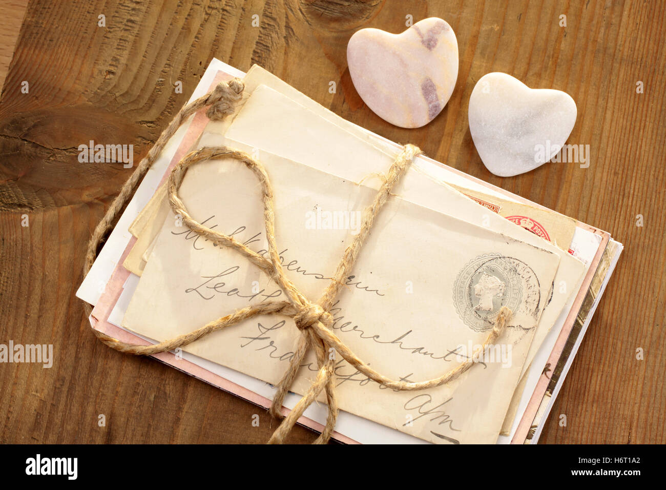 stone hearts and letter bundles Stock Photo