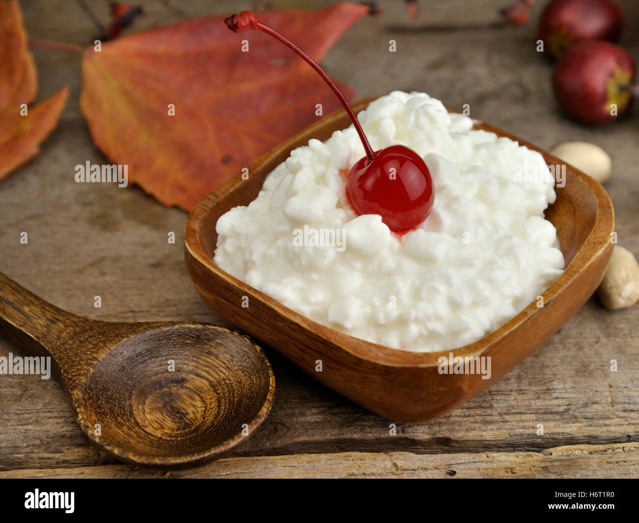 cheese milk product white cottage cheese food aliment wood cherry cheese rustical rustic wooden calcium dairy milk product Stock Photo