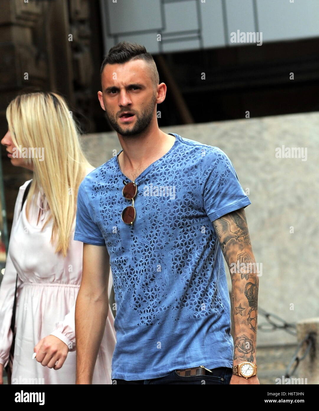 Croatian and Inter Milan footballer Marcelo Brozovic out shopping in Milan with his girlfriend  Featuring: Marcelo Brozovic Where: Milan, Italy When: 30 Sep 2016 Credit: IPA/WENN.com  **Only available for publication in UK, USA, Germany, Austria, Switzerl Stock Photo