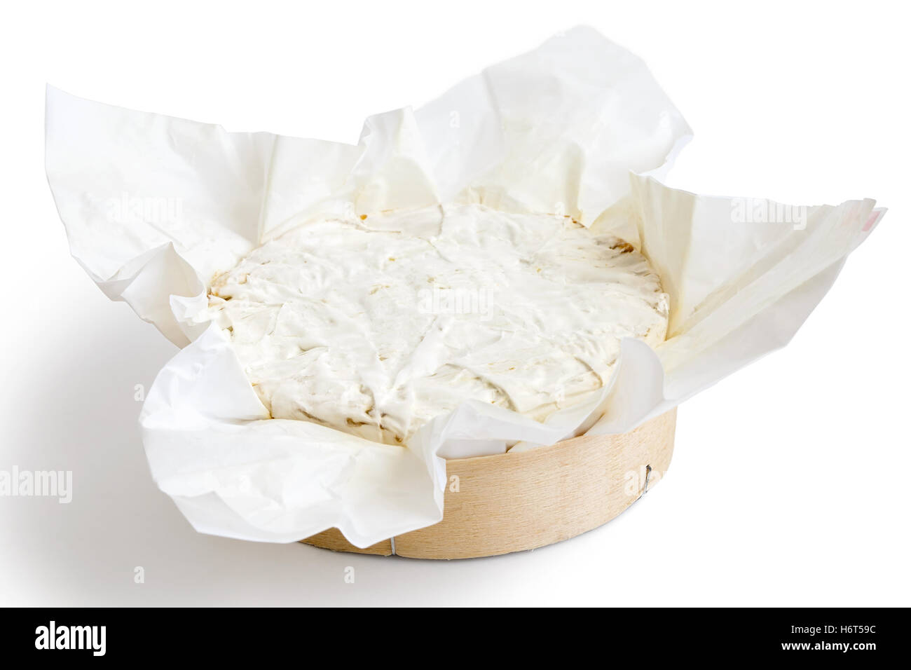 White mould cheese in wrapping isolated white. Stock Photo