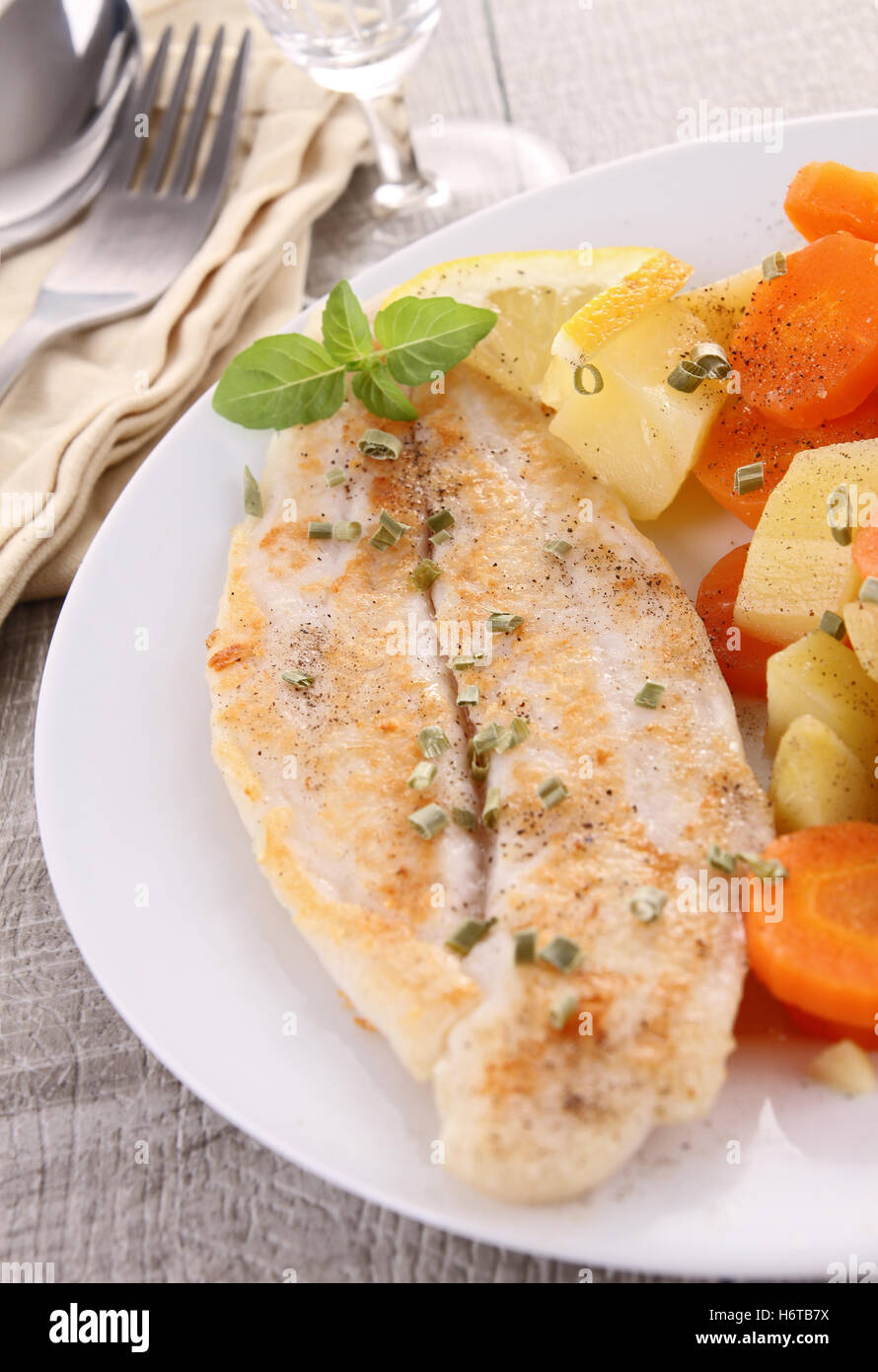 restaurant food aliment gastronomy angle fish vegetable diet trout carrot fork dish meal grilled lunch fillet supper dinner Stock Photo