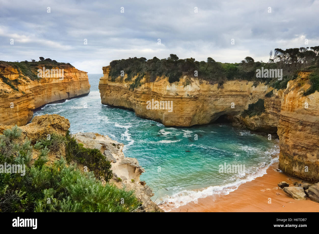 travel holiday vacation holidays vacations tourism beach seaside the beach seashore waves attraction formation rock australia Stock Photo