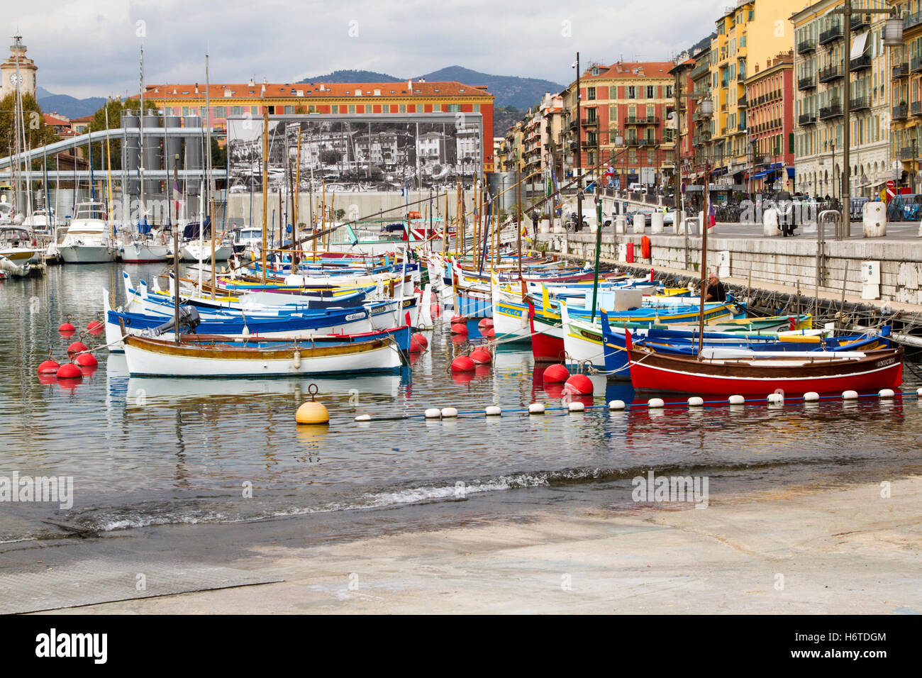 Colourful fishing boats moored at Port Lympia, Nice France Stock Photo