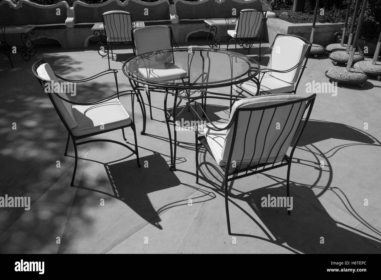 Furniture, patio, metal, black, iron, wrought, outdoor, chair, garden, empty, design, relax, table, white, ornate, seat, relax. Stock Photo