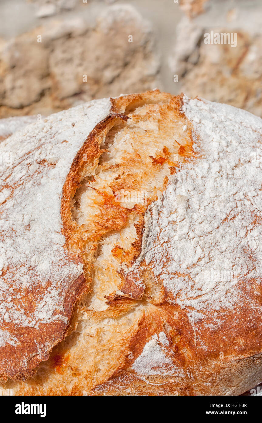 Close up of French crusty bread or Farmhouse Loaf Stock Photo