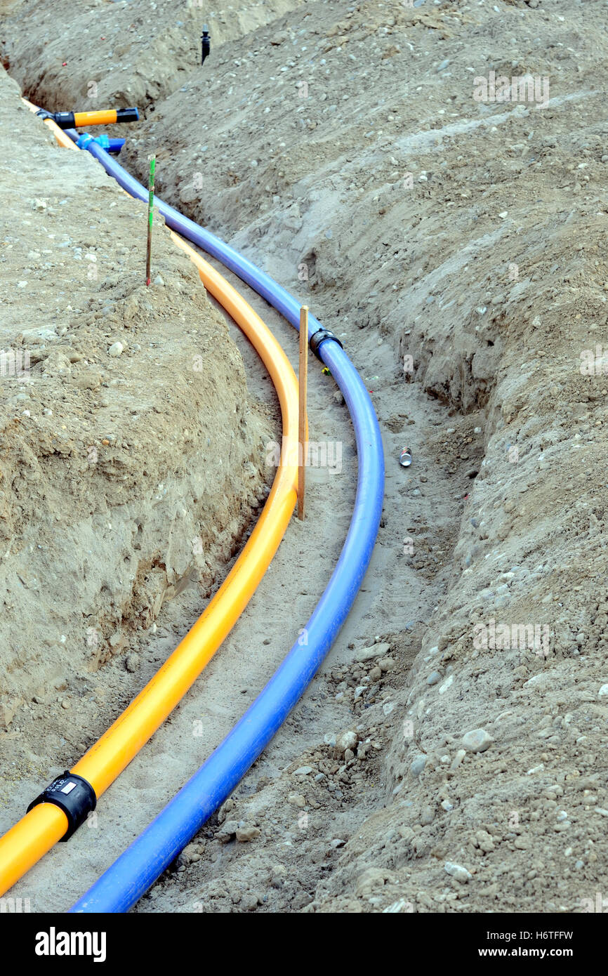laying of gas and water pipes Stock Photo