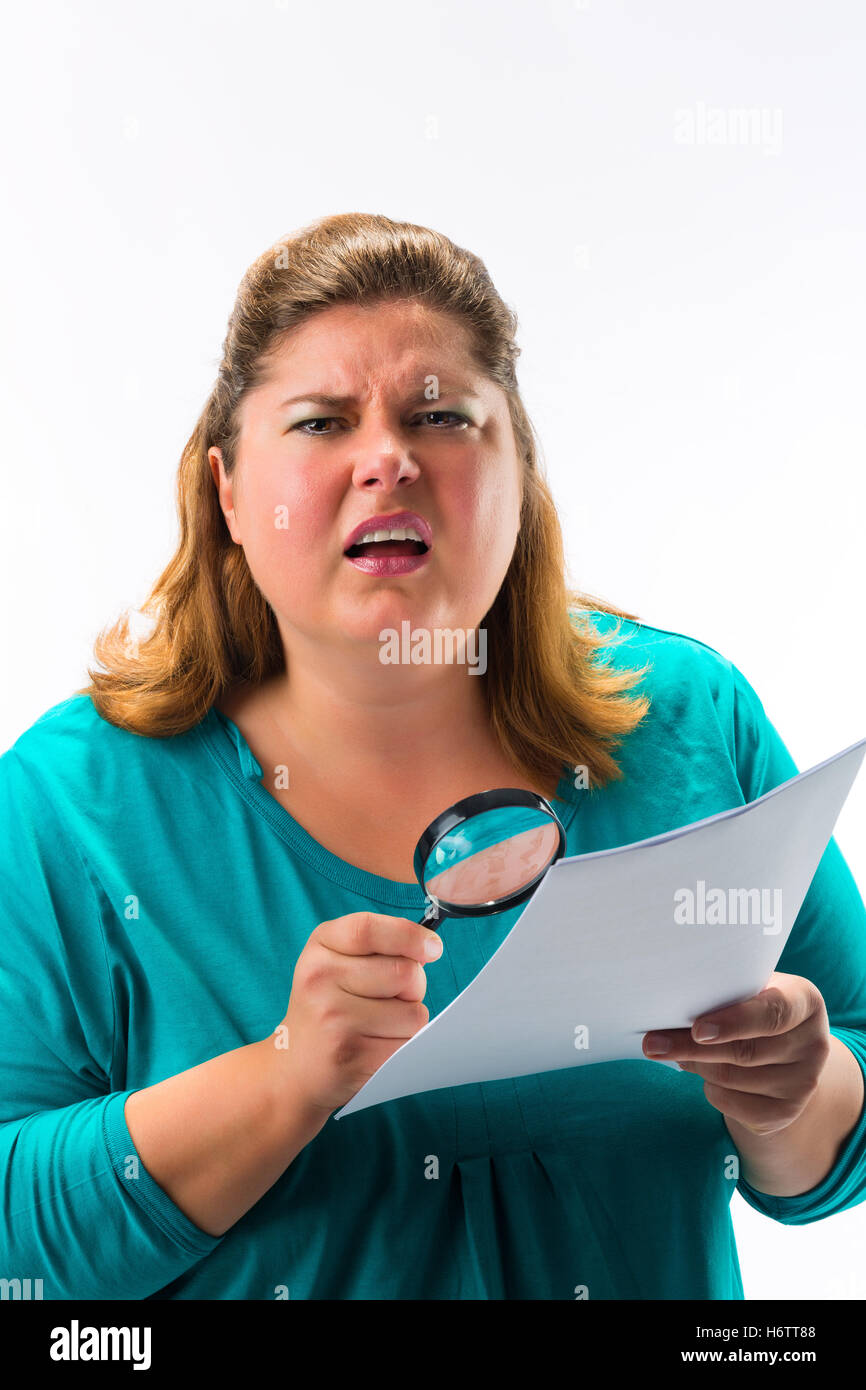 woman looks through magnifier magnifying glass Stock Photo - Alamy