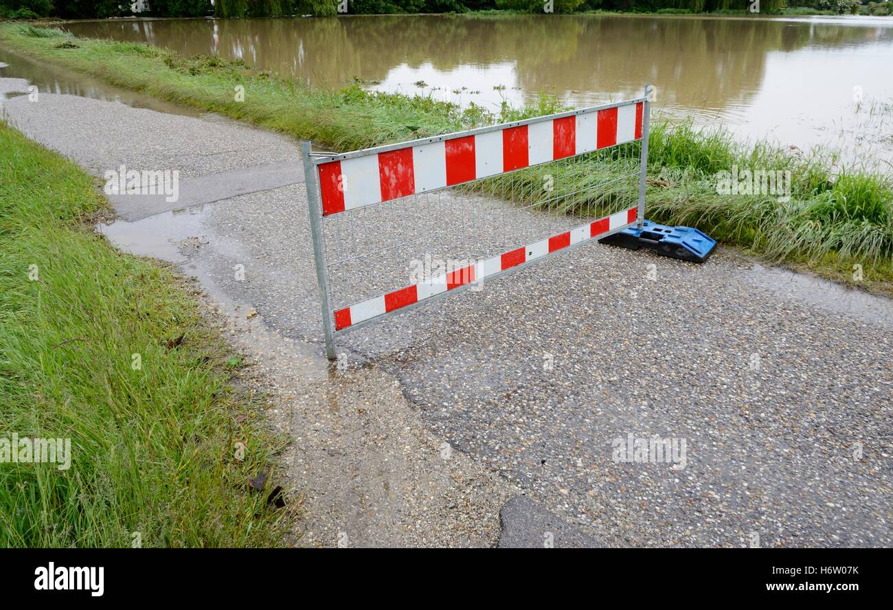 sign signal danger environment enviroment emergency wet flood traffic sign disaster weather damage damages detriments climate Stock Photo