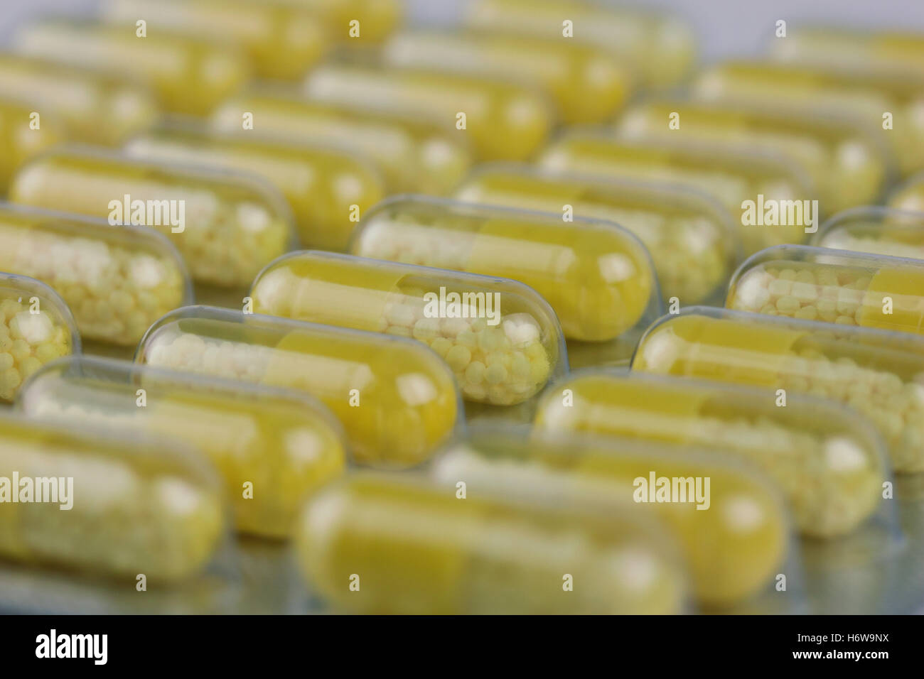 Yellow Capsules Drugs Stock Photos & Yellow Capsules Drugs Stock Images