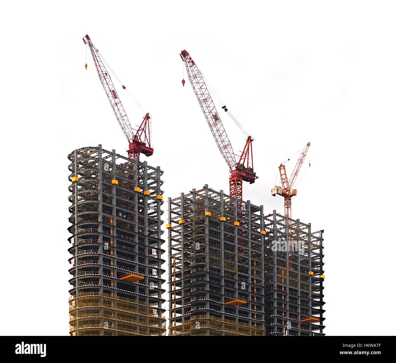 Half finished skyscraper steel frames with cranes on top Stock Photo ...
