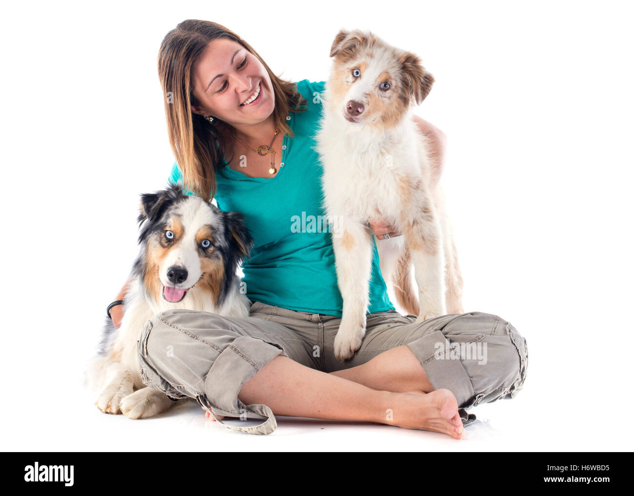 woman dog puppy girl girls blue laugh laughs laughing twit giggle smile smiling laughter laughingly smilingly smiles brown Stock Photo