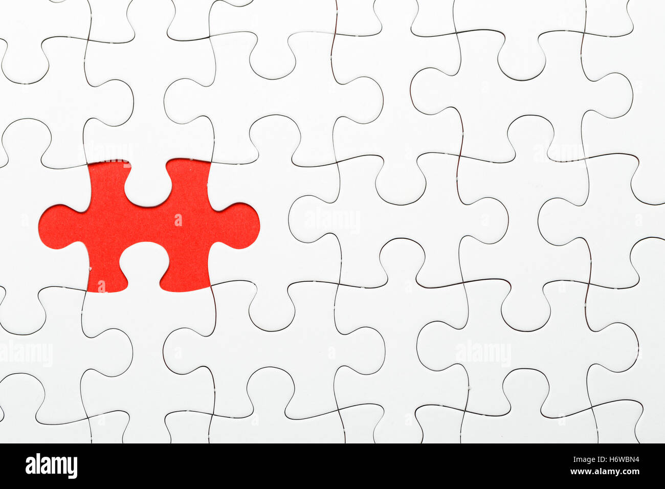 Jigsaw puzzle with missing piece. Missing puzzle pieces Stock Photo