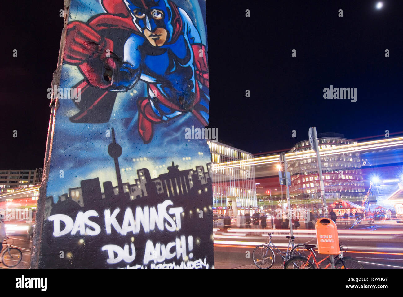 Potsdamer Platz with a piece of the wall at night, Berlin Stock Photo
