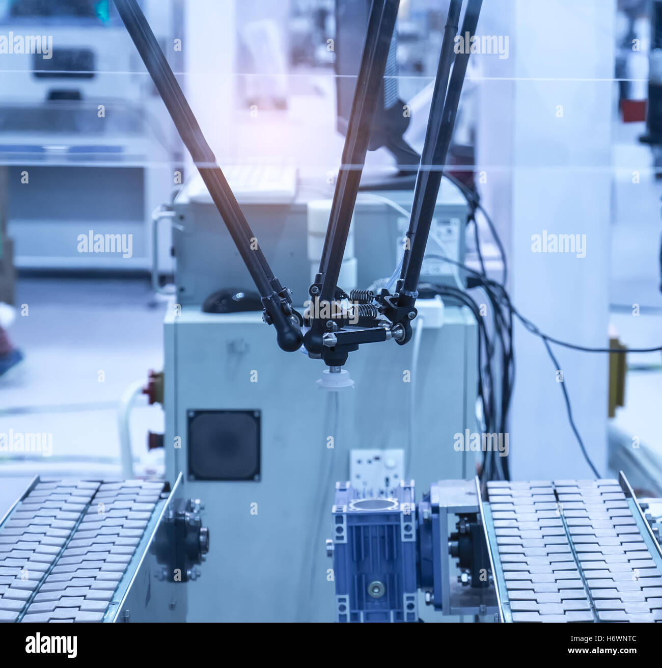 Robotic arm at production line in factory Stock Photo - Alamy