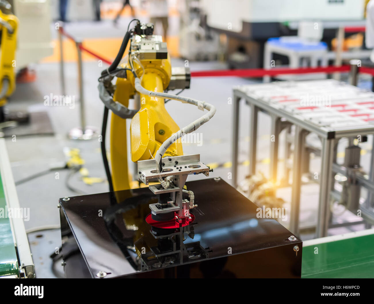 Robotic arm at production line in factory Stock Photo - Alamy
