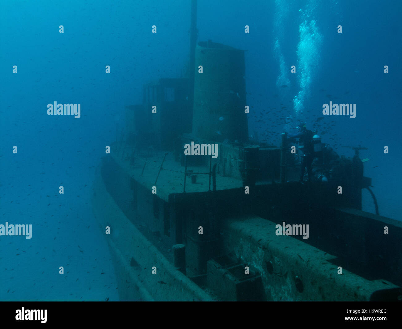 Divers on a sunken tug. Stock Photo