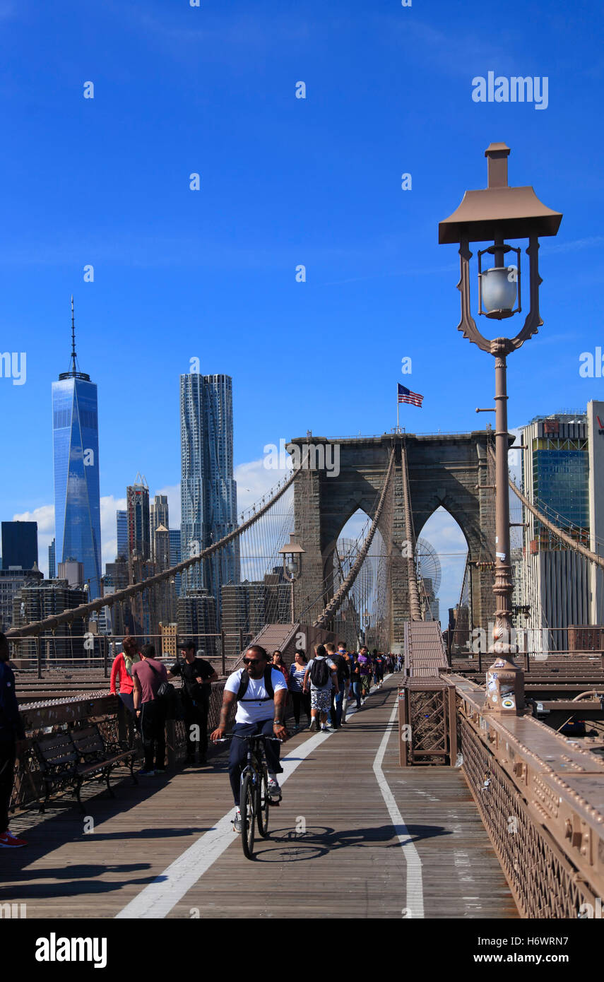 Tourists on Brooklyn Bridge, New York, USA Stock Photo