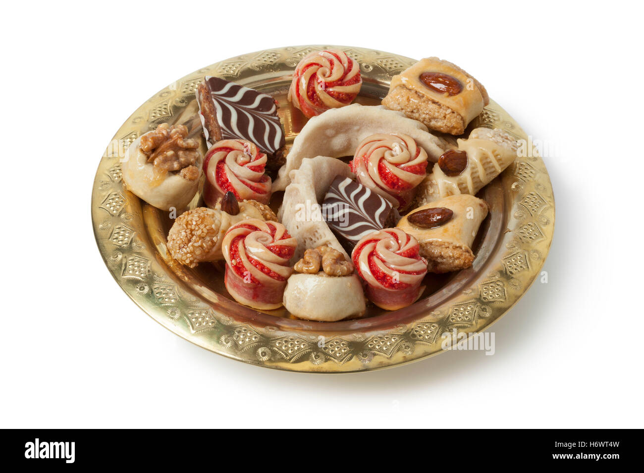 Dish with festive moroccan cookies on white background Stock Photo