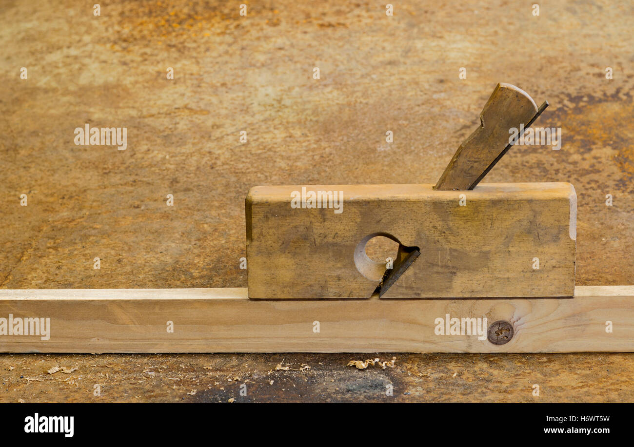 planer on wood in rusty background Stock Photo