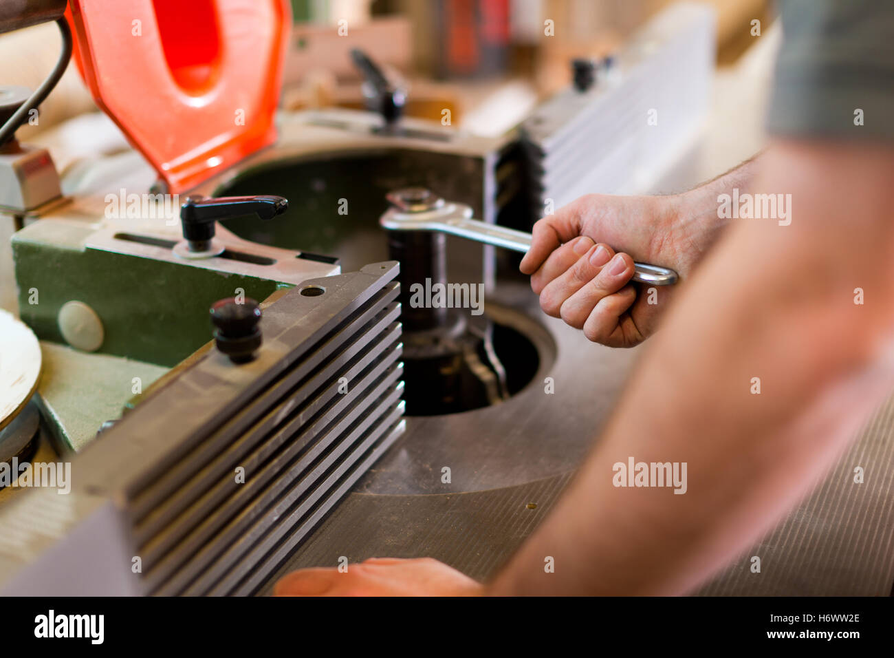 wood milling with electric cutter in joinery. color toning. copy space  Stock Photo - Alamy