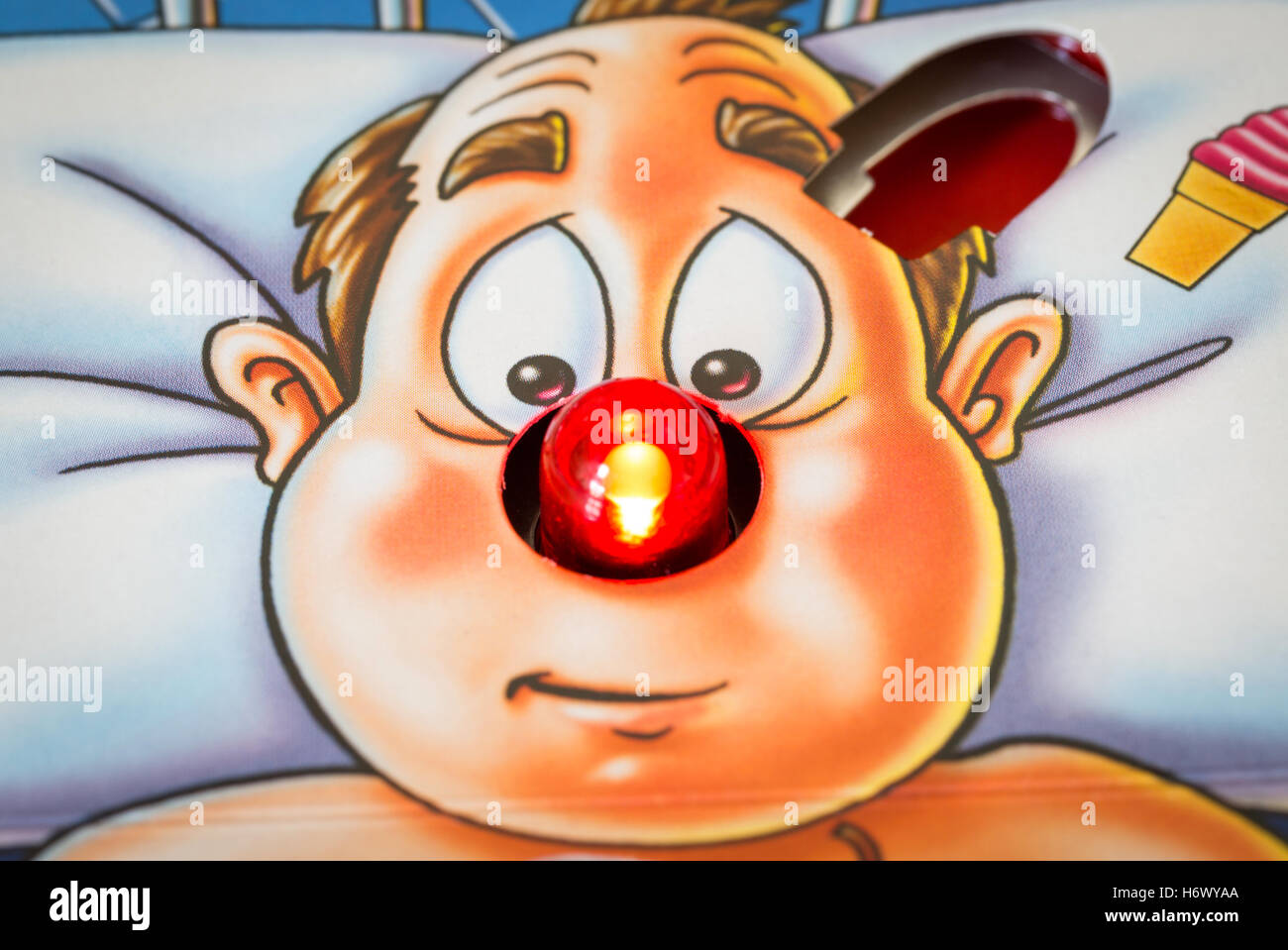 Operation Board Game with the patient's nose flashing Stock Photo