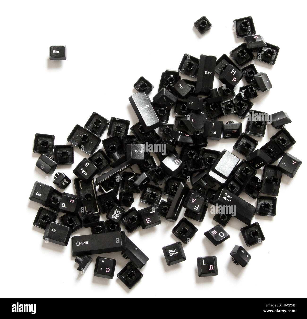 Scattered keyboard keys with separated escape key Stock Photo