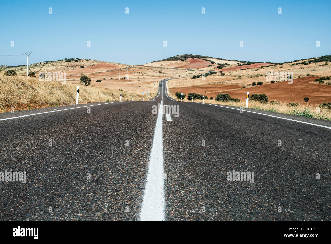 Asphalt road blue sky hi-res stock photography and images - Alamy