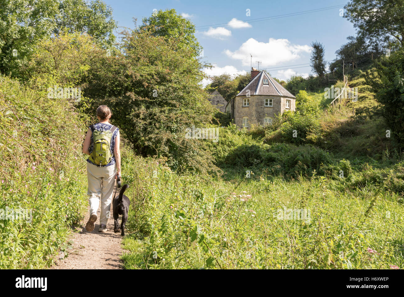 Walking on the Thames & Severn Canal and Wysis Way, part of the Cotswold Canals, near Stroud, Gloucestershire, England, UK Stock Photo