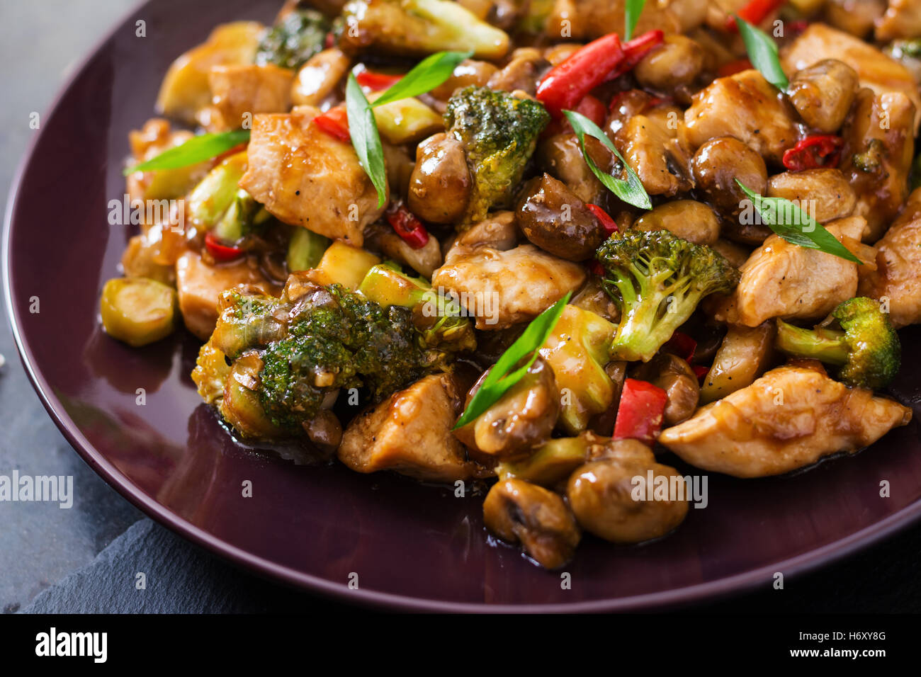 Stir fry with chicken, mushrooms, broccoli and peppers - Chinese food