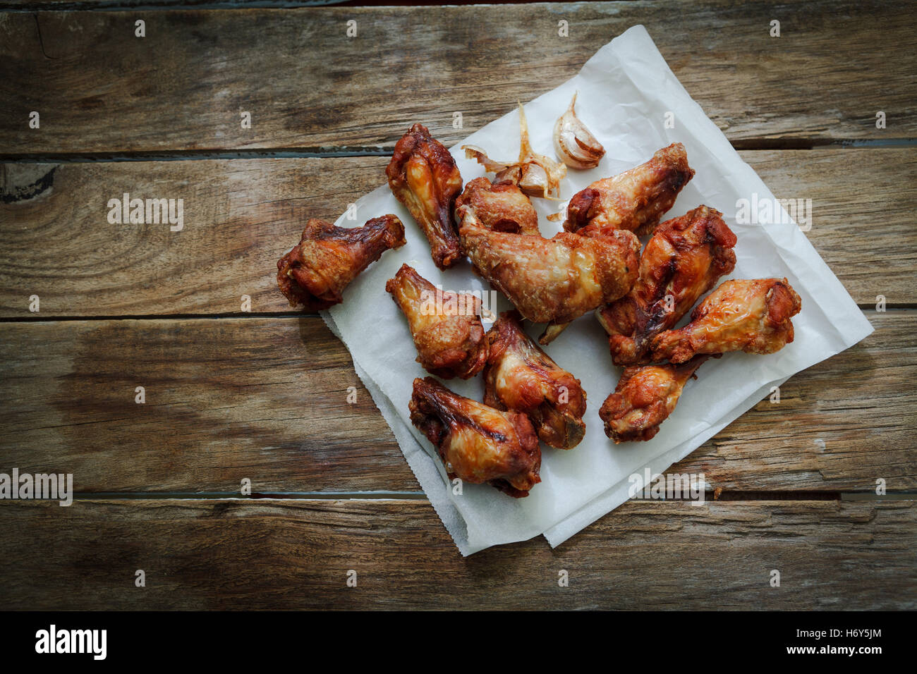 deep fried chicken wings on fryer with garlic Stock Photo Alamy