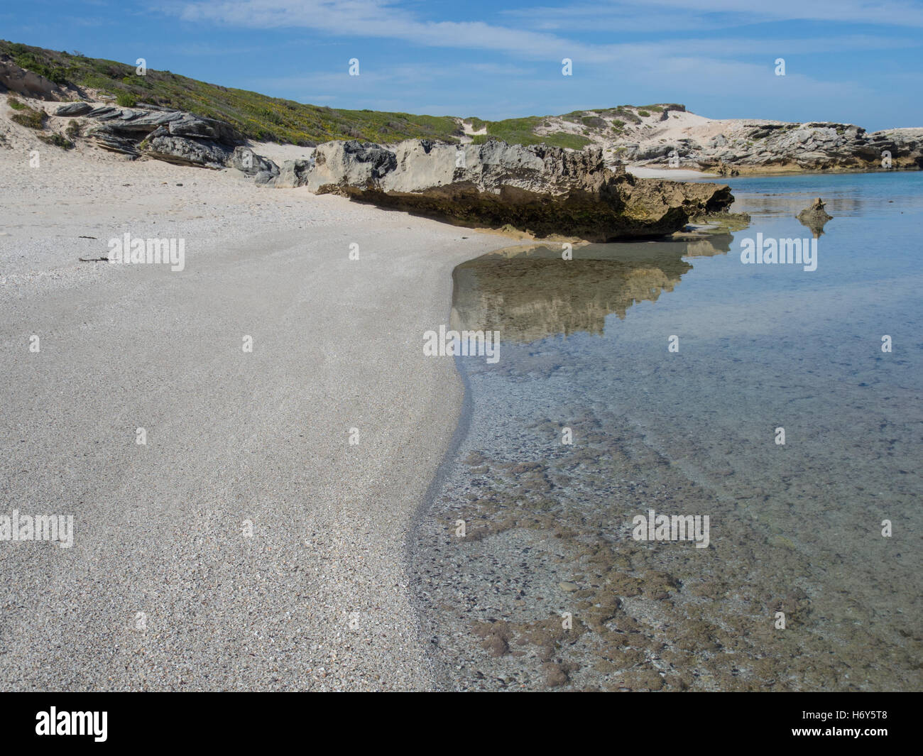 Crystal clear water and white beach at South Africa's coast. Taken at De Hoop Nature Reserve. Stock Photo