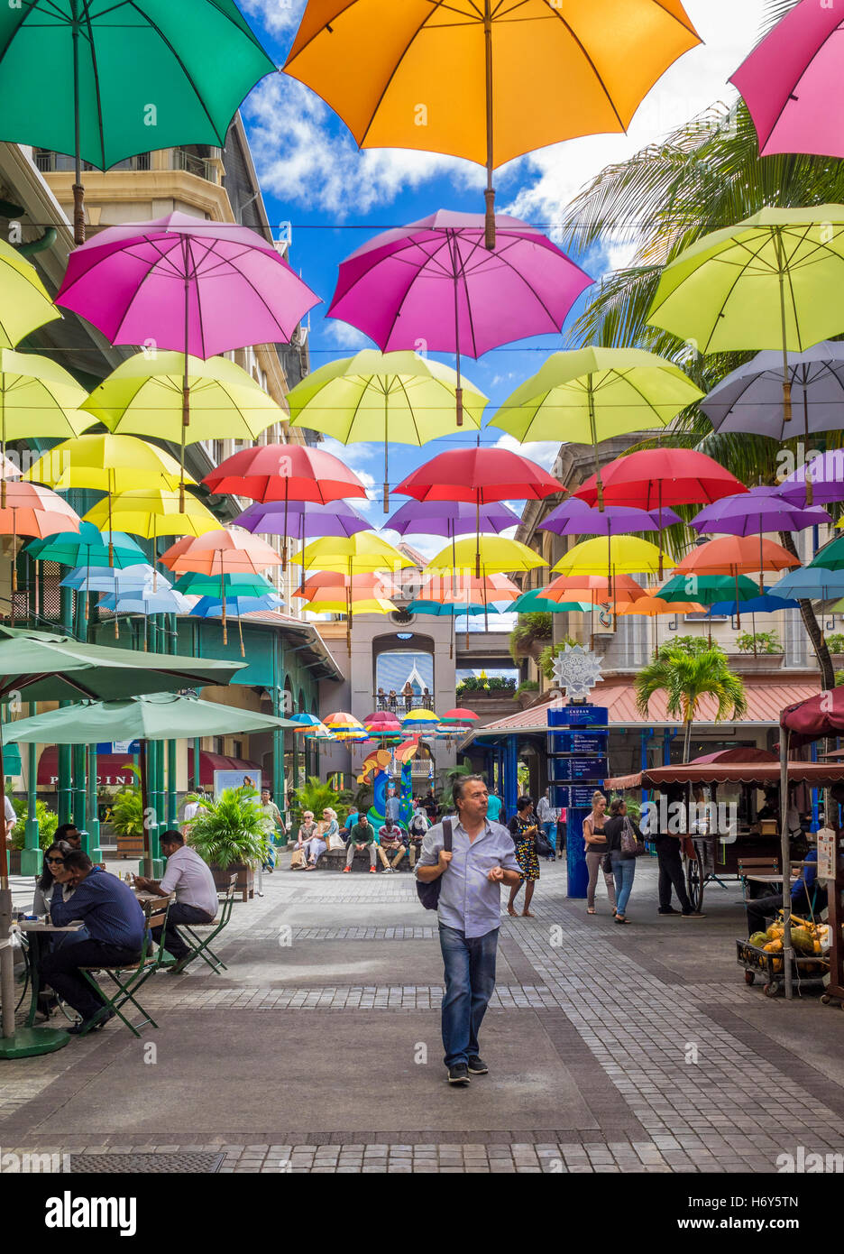 Umbrella art display in street at Caudan Waterfront, Port Luis