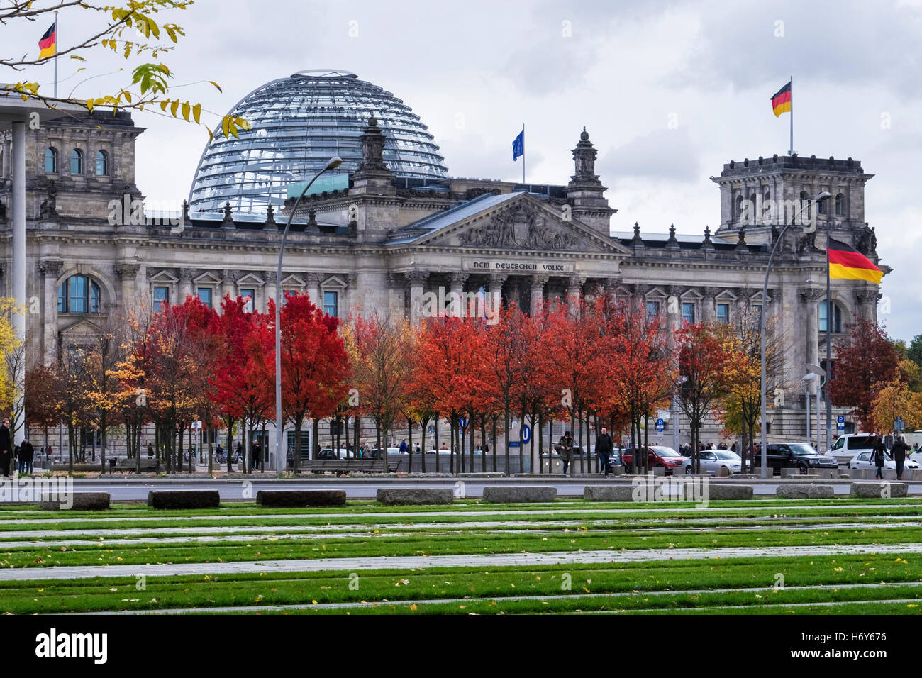 Berlin, Mitte. Reichstag Building In Autumn. German Parliament Bundestag, Norman Foster Dome, colorful trees Stock Photo